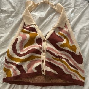Backless crop top with cream and orange tones